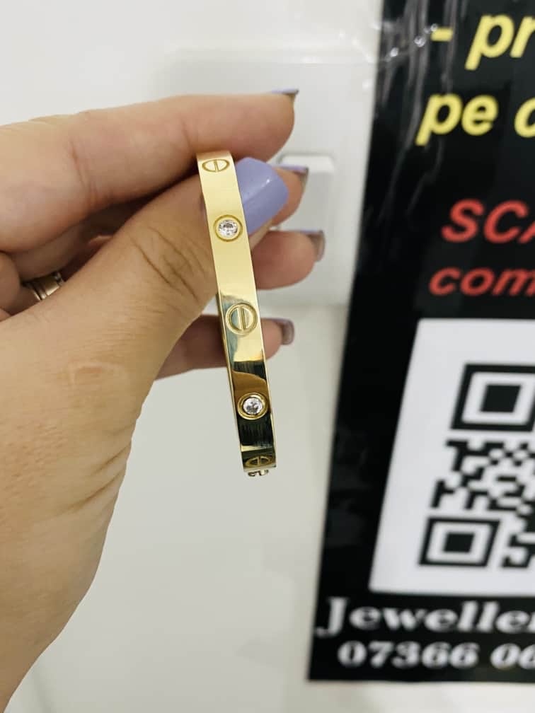 14k gold bangle bracelet with Screw and stone - Image 2