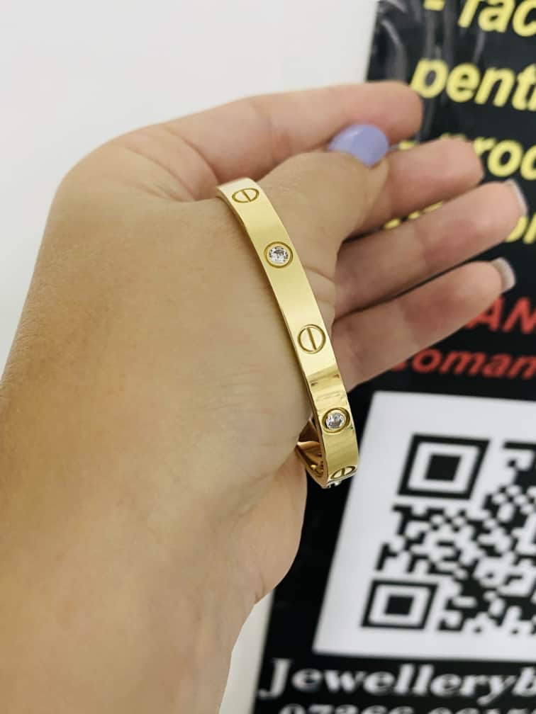 14k gold bangle bracelet with Screw and stone - Image 3