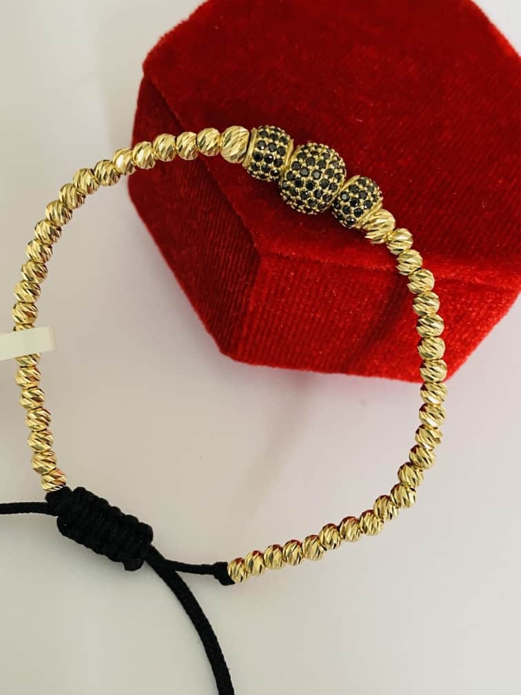 Black string bracelet with 14k gold 25Janu00M