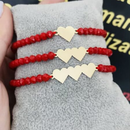 14k gold heart with red crystal beads and string 3H
