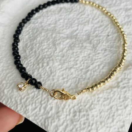 Unique bracelet with 14k gold 2.5mm beads with small charm  and 3mm spinel  beads 17.5cm